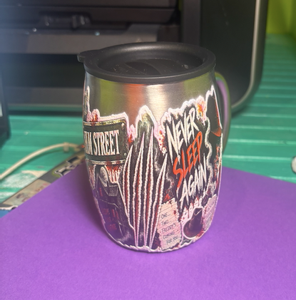 Back view of a custom UV printed horror-themed mug