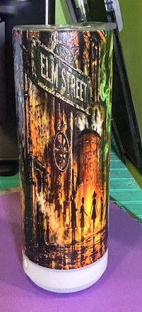 Side view of a custom UV printed horror-themed tumbler